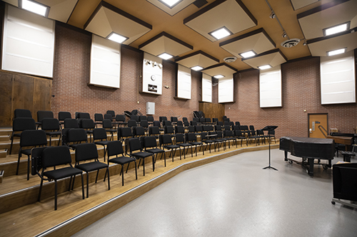 Photo of Forsyth 115 - band room with chairs setup for full band practice